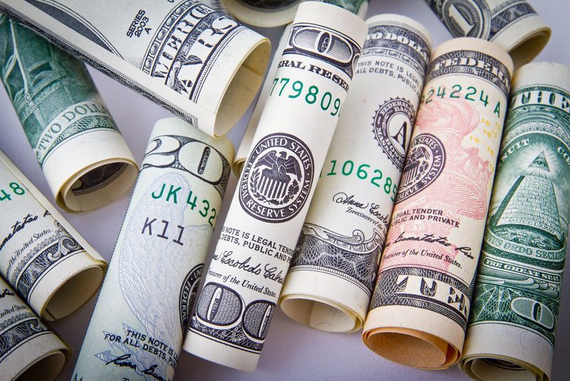 Couple comparing FHA and conventional loan requirements at home
