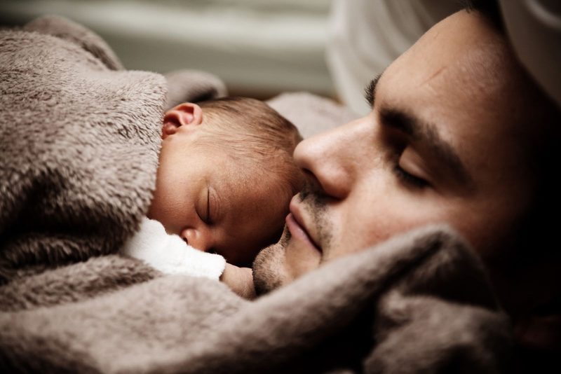 Family at home, representing the dependants a life insurance death benefit protects
