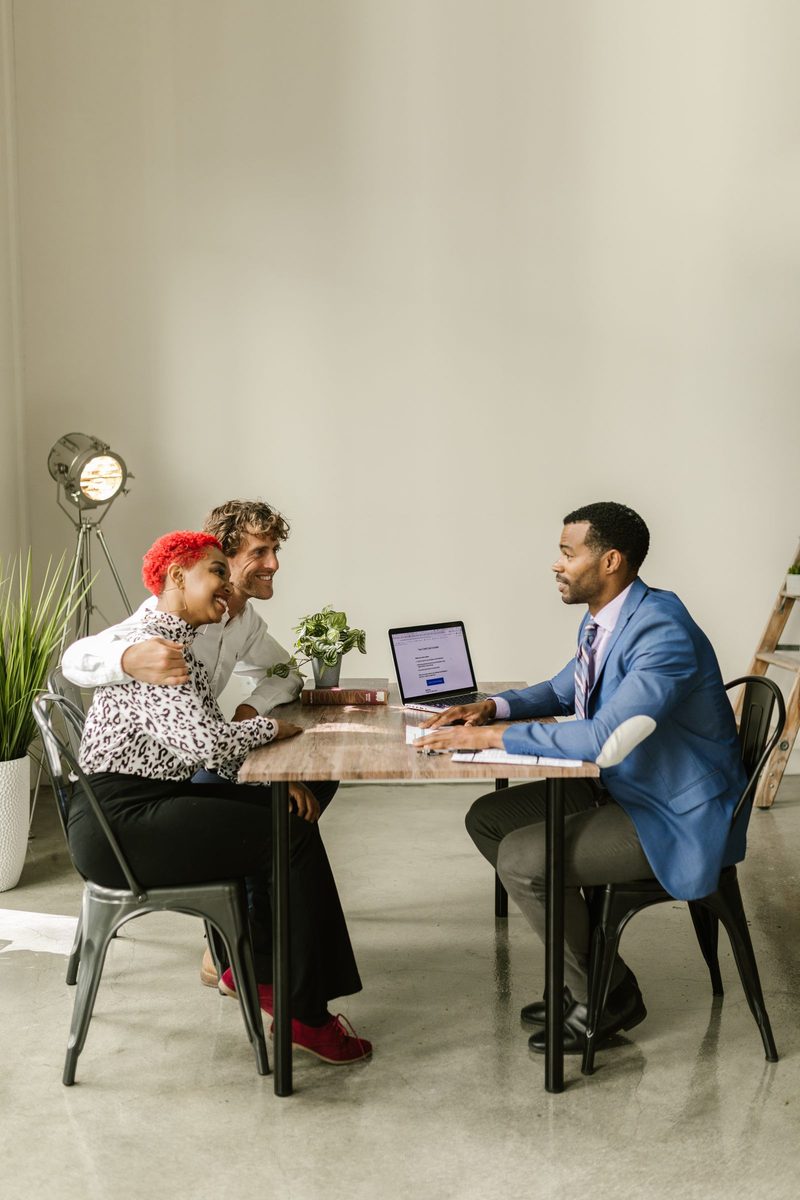 Person reviewing a life insurance policy schedule and premium table