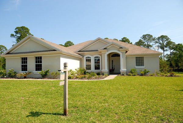 Homeowner reviewing mortgage refinance rate quotes and documents