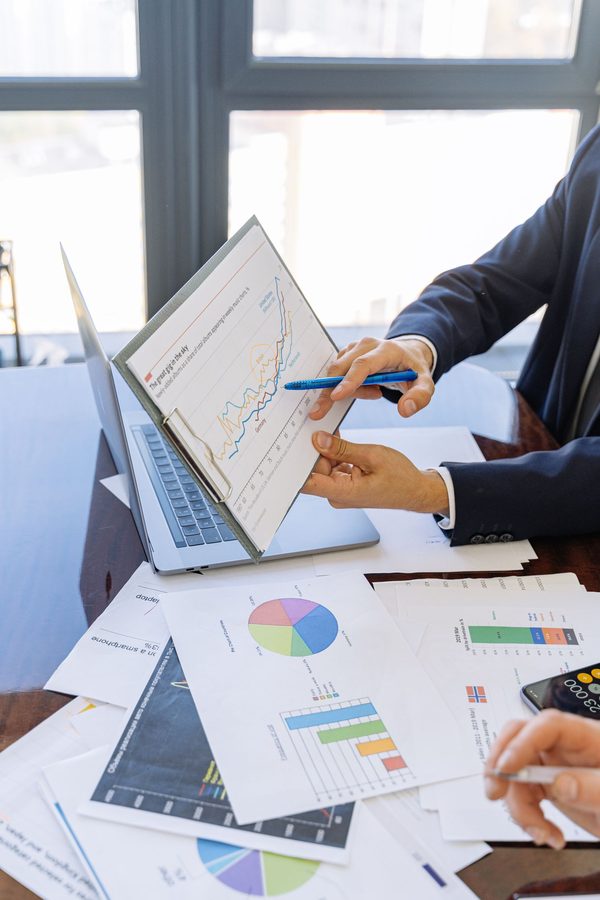 Small business owner preparing an SBA 7(a) loan application package