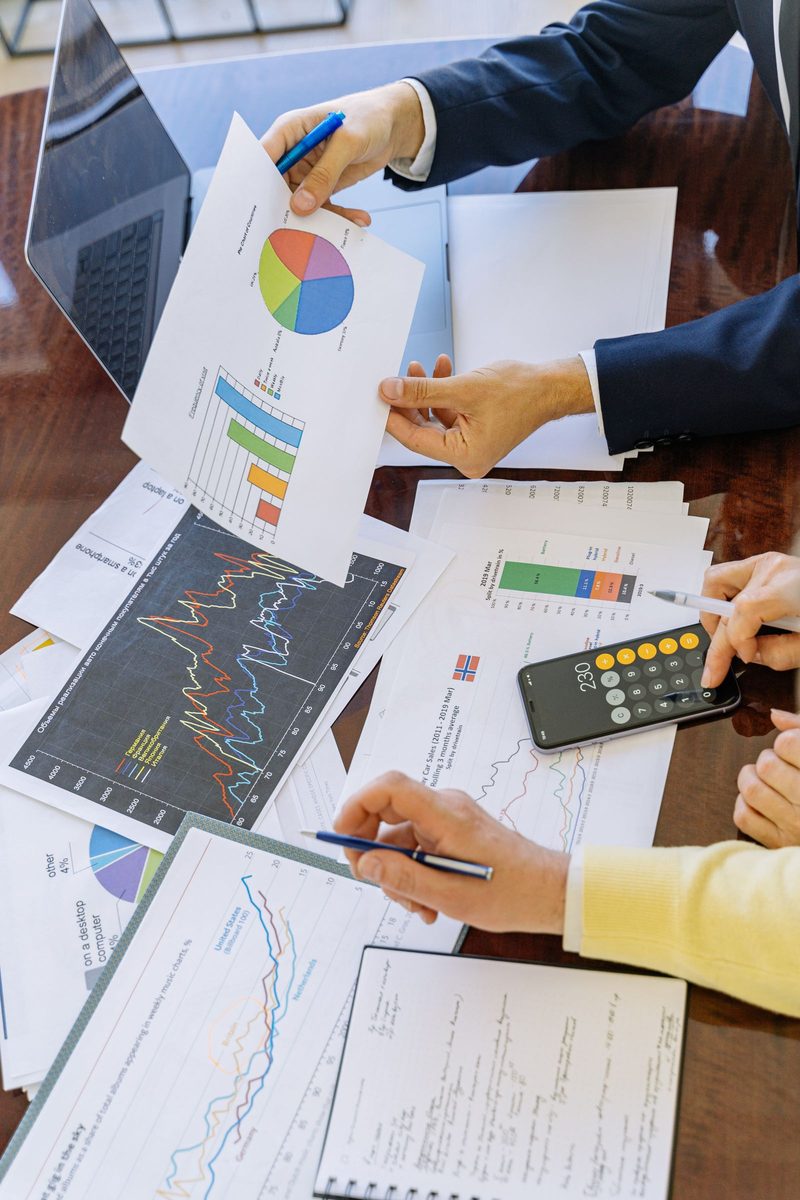 Lender reviewing business financial statements during SBA loan underwriting